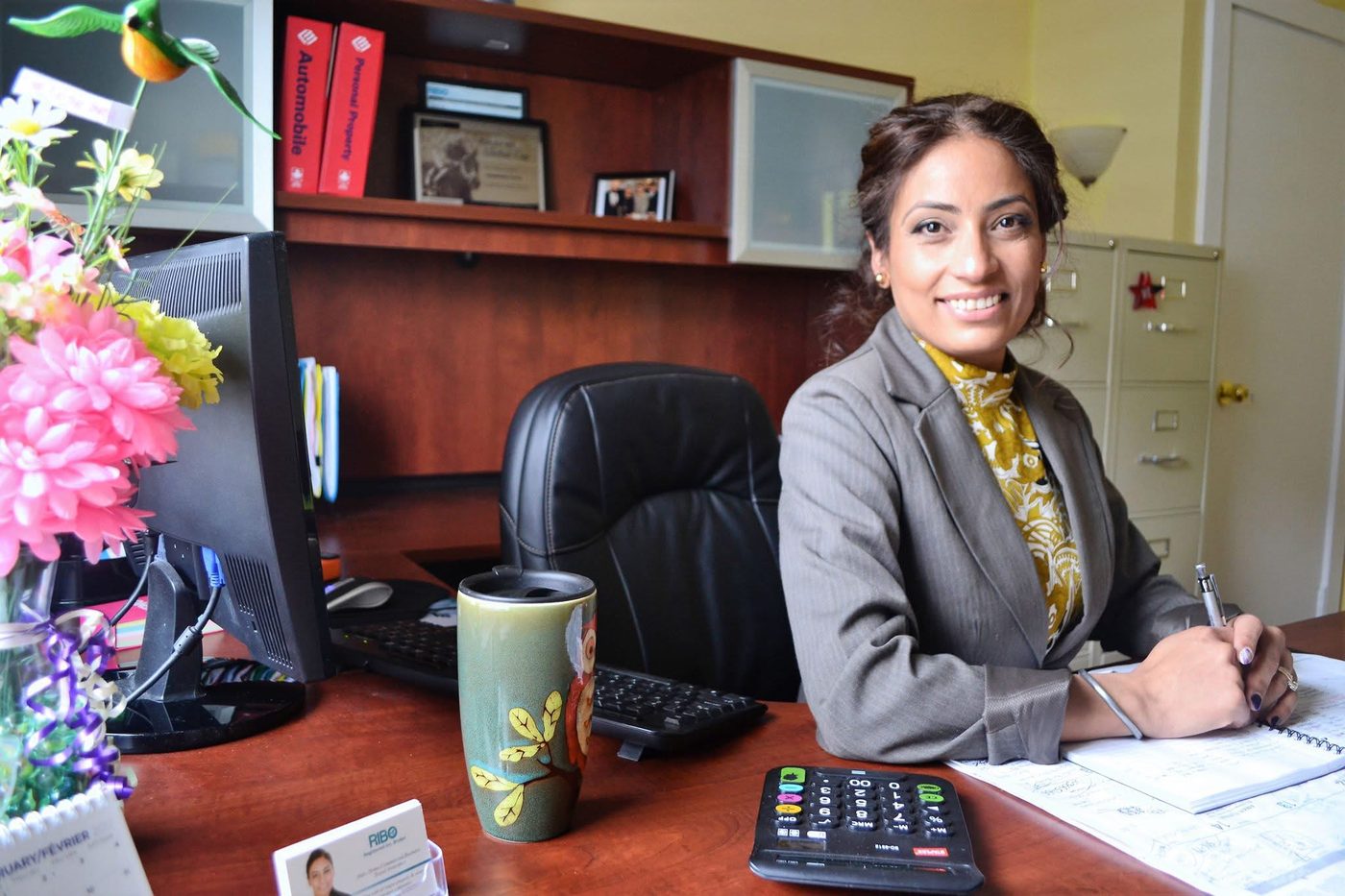 Aman Turna working at her desk